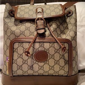 Gucci backpack, worn once. With box and receipt.